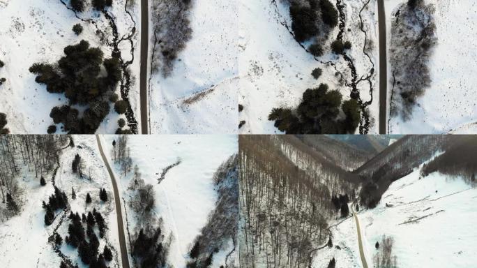 无人机透视飞越山路和积雪覆盖的景观
