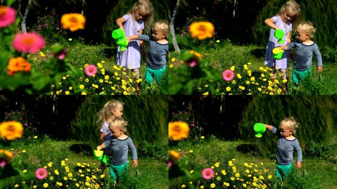 有趣的小园丁孩子们在花园里用小喷壶浇花
