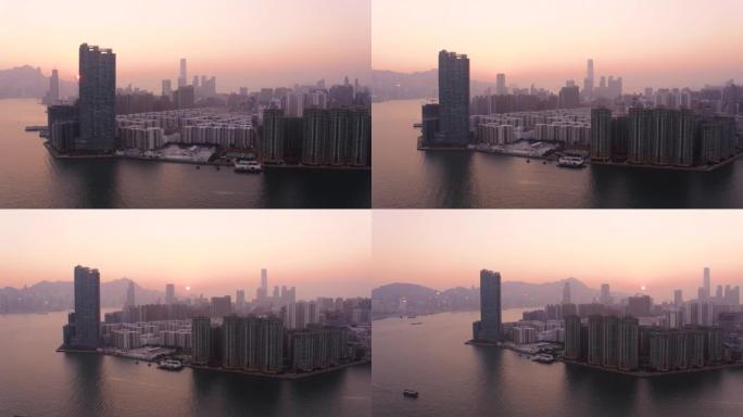 香港空中v121低空飞越九龙湾平移，城市景观日落