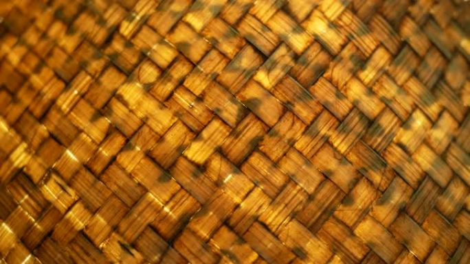 用竹片编织的木头制成的手工灯的特写纹理。