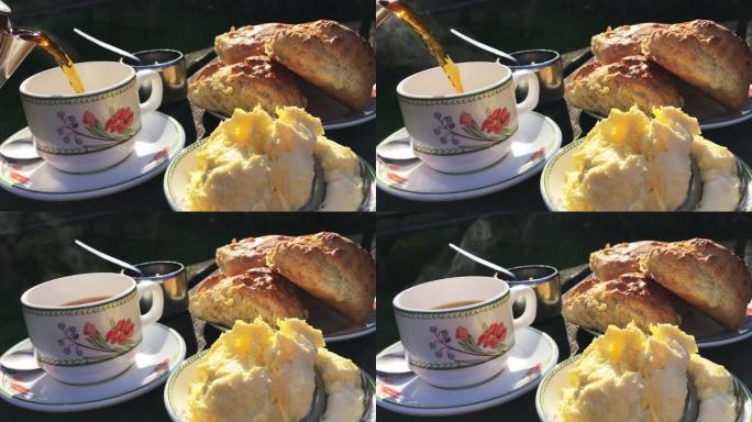 英国奶油茶阳光明媚的下午餐桌