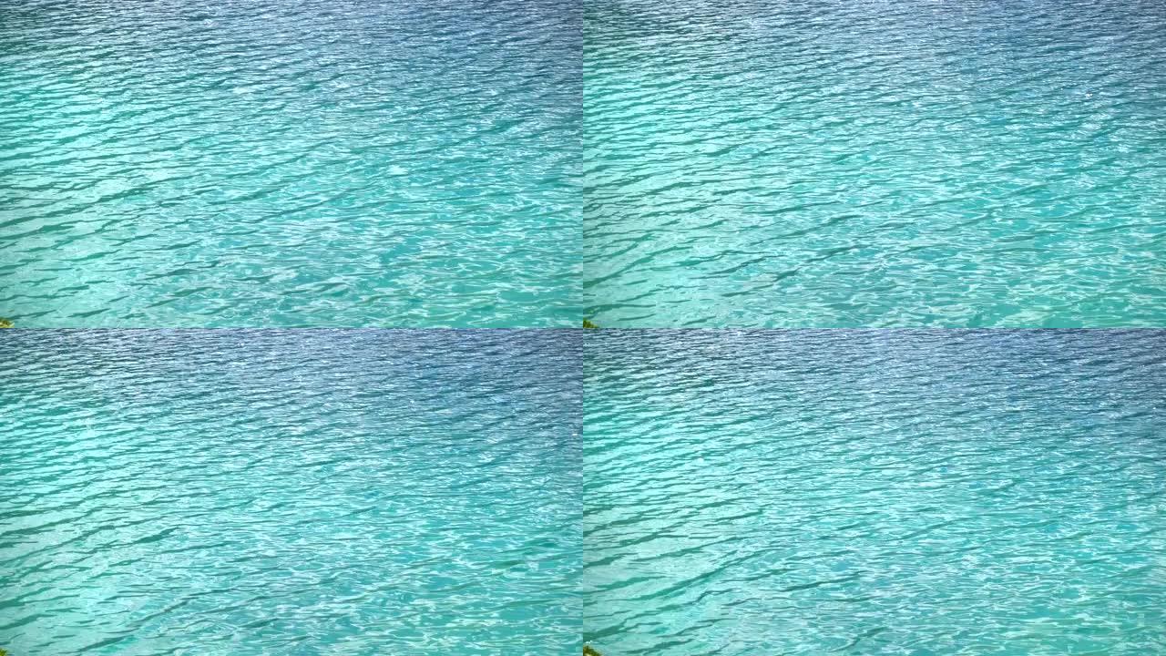 蓝色水背景蓝色湖水波光粼粼浅海海水