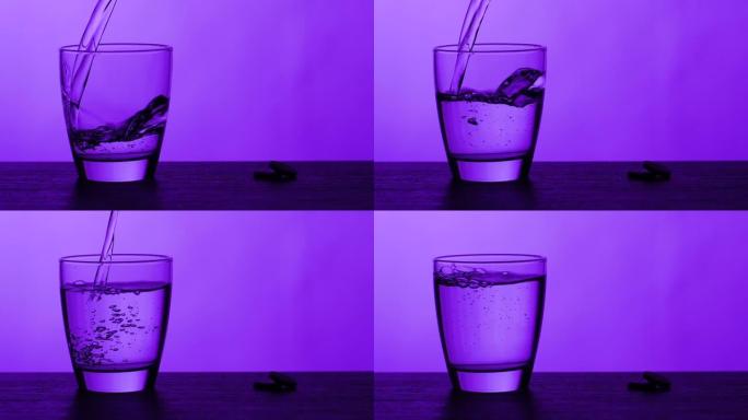 倒杯水-紫色背景倒杯水水杯