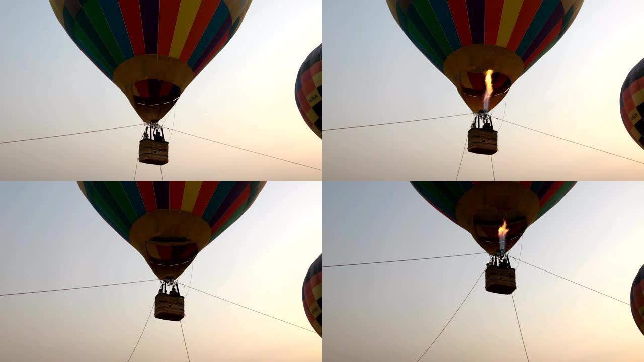 日落时间彩色热气球中丙烷燃气燃烧器的特写视频
