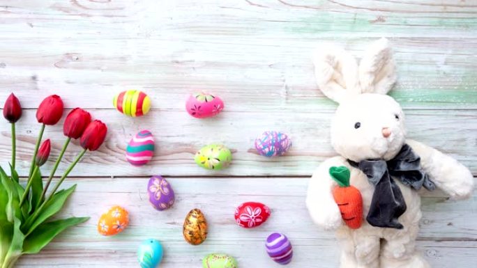 复活节彩蛋，花和兔子娃娃定格动画。