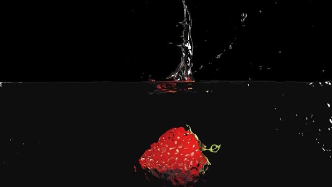 草莓落在桌子上，水滴飞溅。慢动作