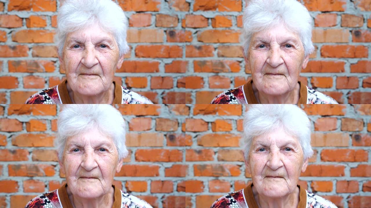 看着镜头的白发老妇的肖像。严重沉思的皱纹女性脸上的细节视图。奶奶悲伤的面部表情。慢动作特写