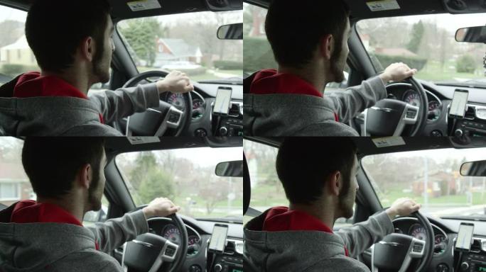 驾驶汽车与男司机交谈