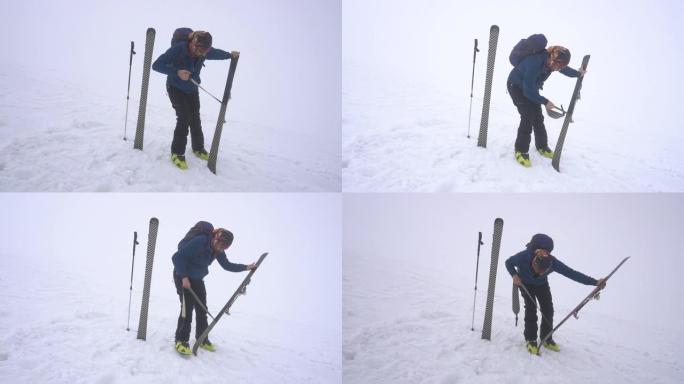 成年登山者去除滑雪皮肤