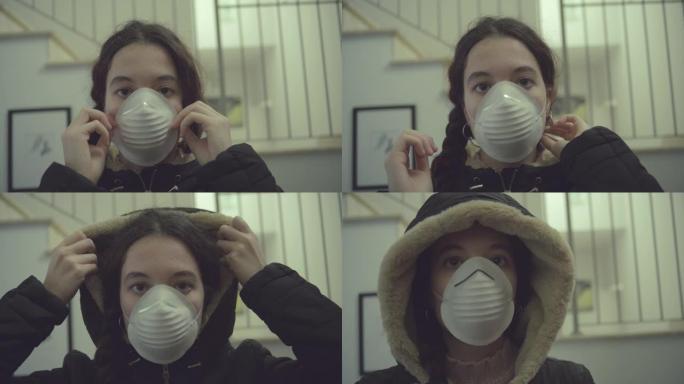 年轻女子在离家前戴着口罩保护自己免受新型冠状病毒肺炎。慢动作拍摄