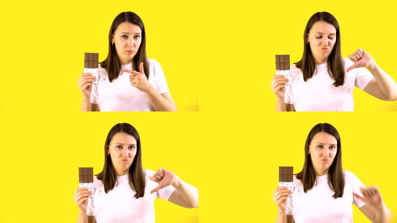 年轻女子用巧克力棒，表明它是有害的。黄色背景。人真诚情感生活理念