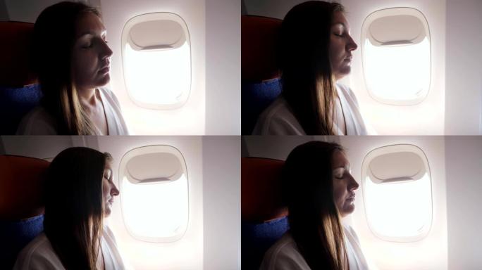 漂亮女人试图在班轮客舱特写镜头中睡觉