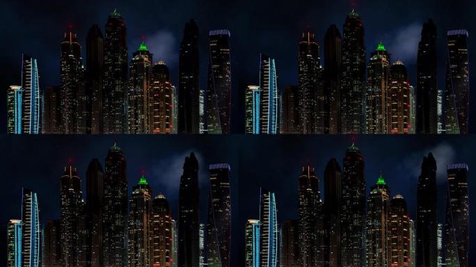 阿拉伯联合酋长国的迪拜城市摩天大楼与美丽的星空对抗