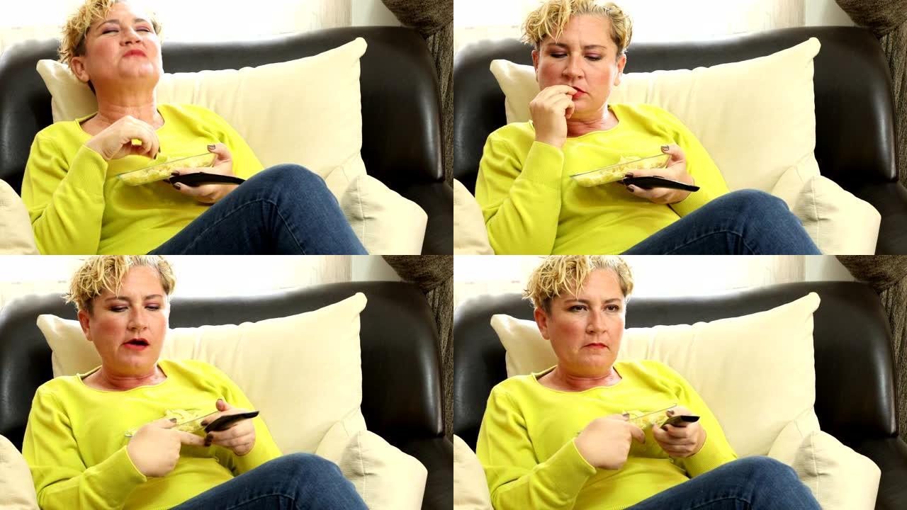 女人吃薯片看电视