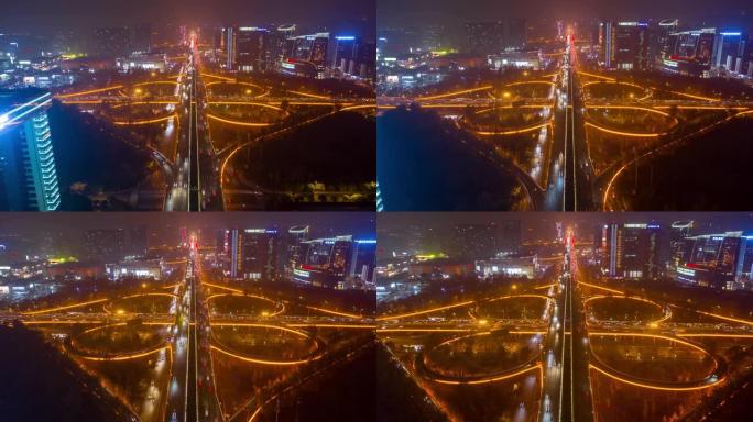 夜间照明成都市中心交通街路口空中延时全景4k中国