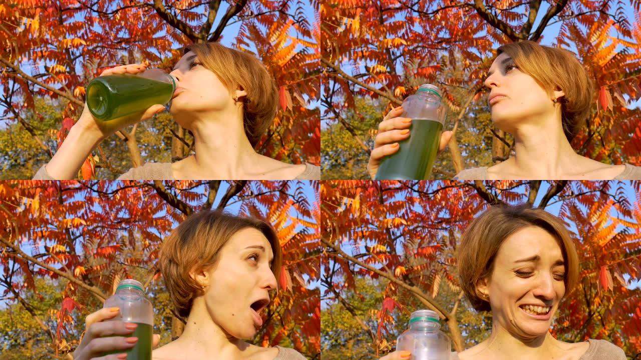 女人对绿色饮料、螺旋藻、小球藻感到失望，这是无味和恶心的。健康生活方式和排毒带来的不便。
