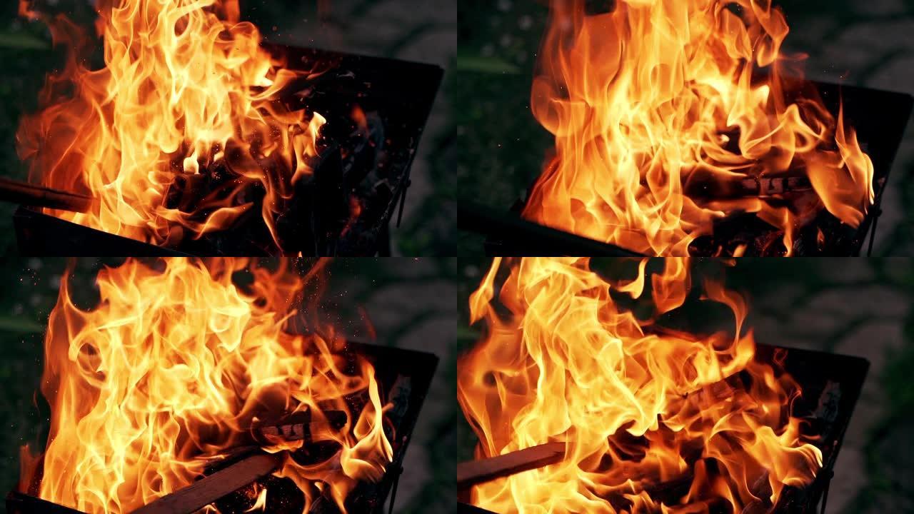 木棍在明亮的火中翻过闷烧的木头。
