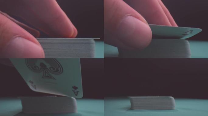 在扑克游戏中，男性手从甲板上拿一张牌的特写镜头