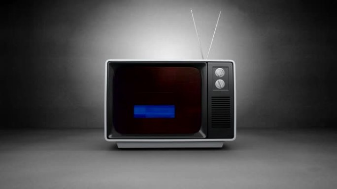 旧电视开机，屏幕上有动画，背景为灰色