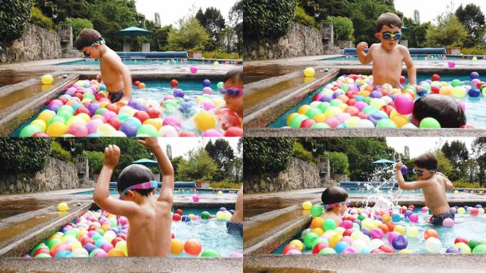 在墨西哥的游泳池玩球的男孩。