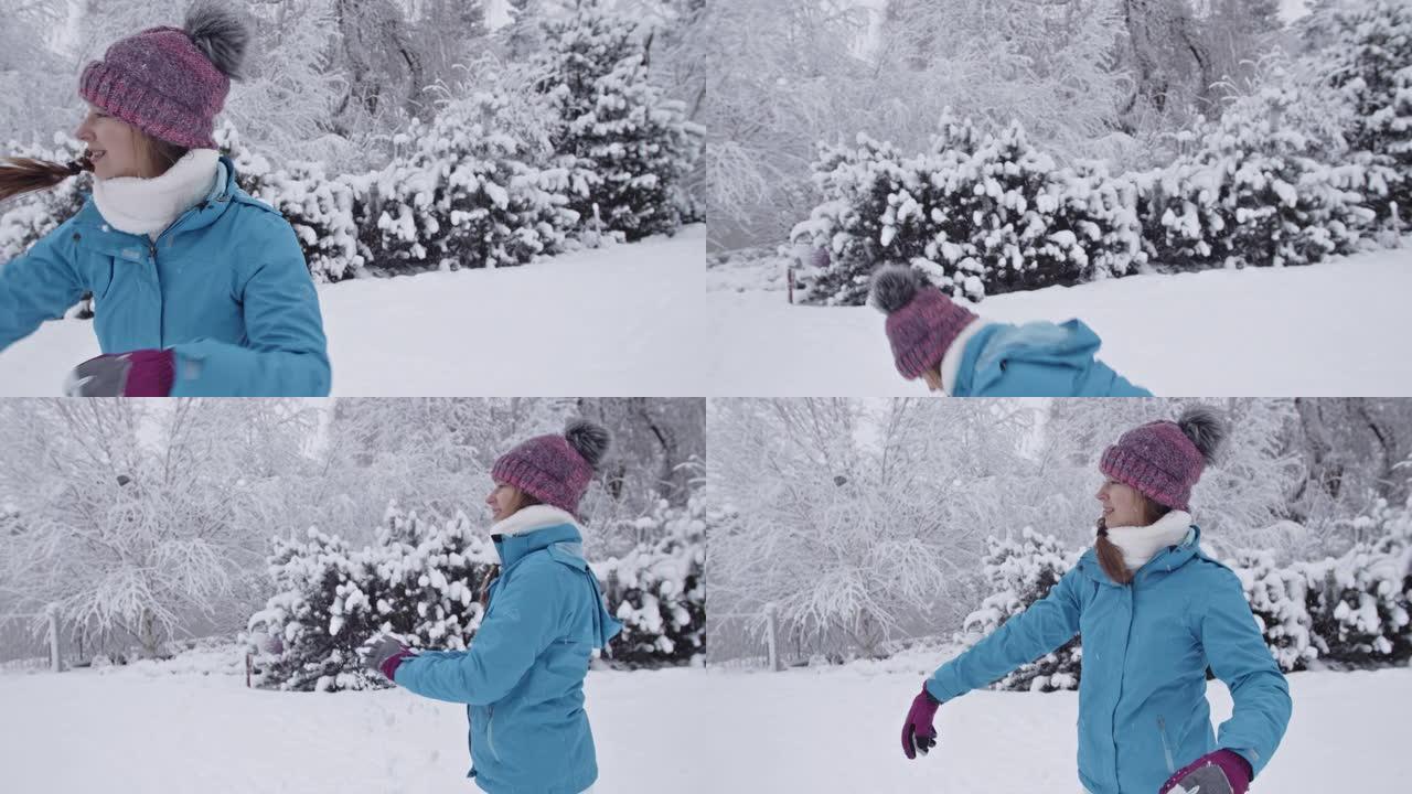 十几岁的女孩扔雪球