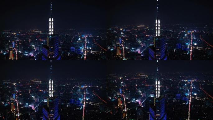 飞越南京城市夜景照明市中心著名塔楼空中全景4k中国