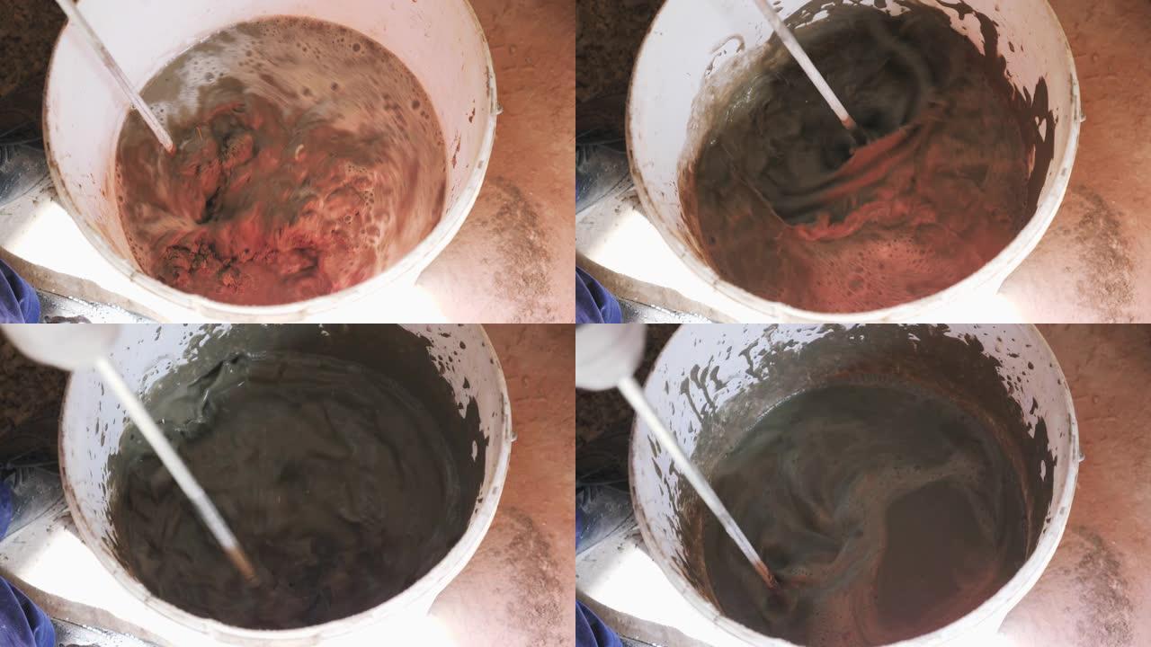 桶内水泥搅拌。混凝土和砂水泥搅拌成砂浆。施工概念