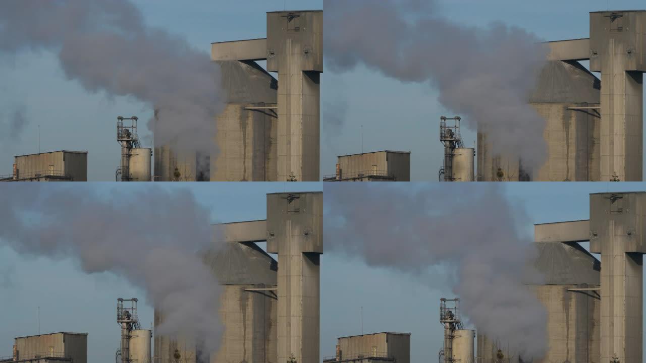 法国诺曼底卡昂附近焚化炉烟囱产生的烟雾和空气污染。