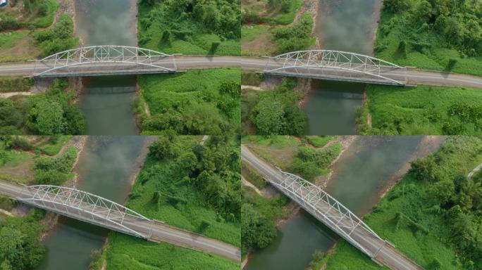 空中无人机镜头自然乡村上的金属桥