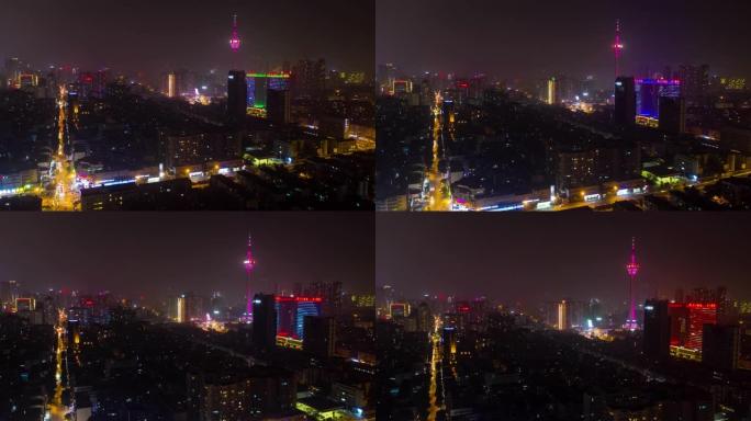 夜间照明成都市著名电视塔区交通街道十字路口空中延时全景4k中国