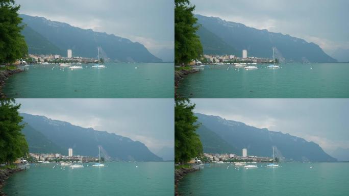 多云的一天蒙特勒市著名的日内瓦湖湾慢动作全景4k瑞士