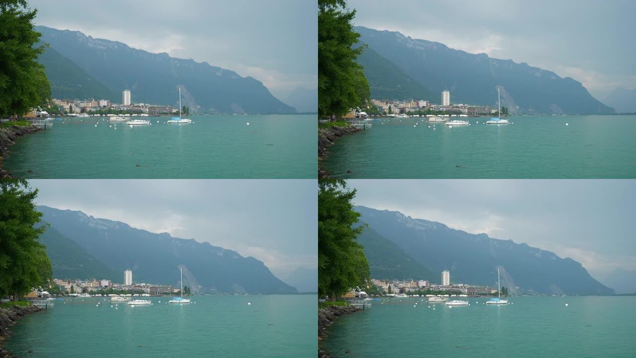 多云的一天蒙特勒市著名的日内瓦湖湾慢动作全景4k瑞士