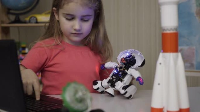 爱好未来。天才女学生在现代教室组装机器人。小女孩在家组装机器人。教育科学，技术儿童，编程电子机器人学