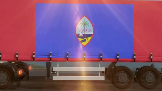 一辆大卡车侧面显示的关岛国旗