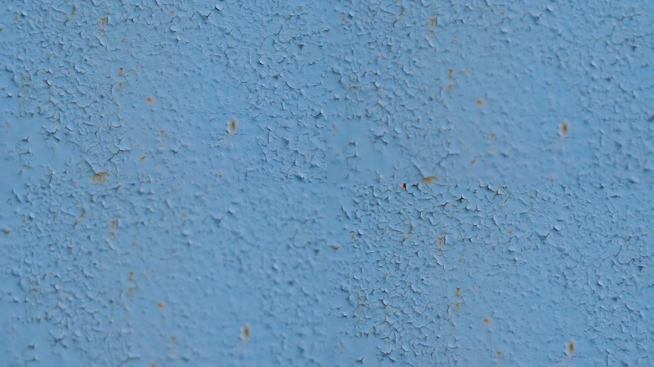 金属蓝色背景墙壁纹理，带有划痕和裂缝。平滑的相机移动和放置文本。运动4k视频，4096x2160镜头