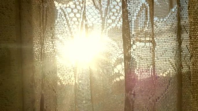 透过窗帘窗间的阳光。眩光镜片