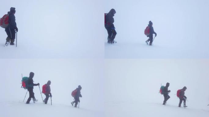 高山登山队在雾山山顶行走