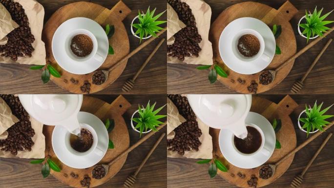 木板上的咖啡杯和咖啡豆。