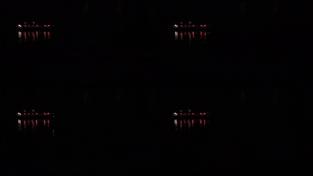 东京市区湾区的一艘夜间船远射