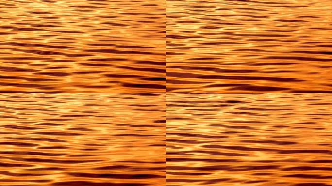 Orange Water是一个库存视频，展示了日落时分阳光反射的有机海水的令人难以置信的镜头