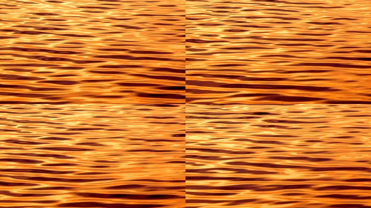 Orange Water是一个库存视频，展示了日落时分阳光反射的有机海水的令人难以置信的镜头