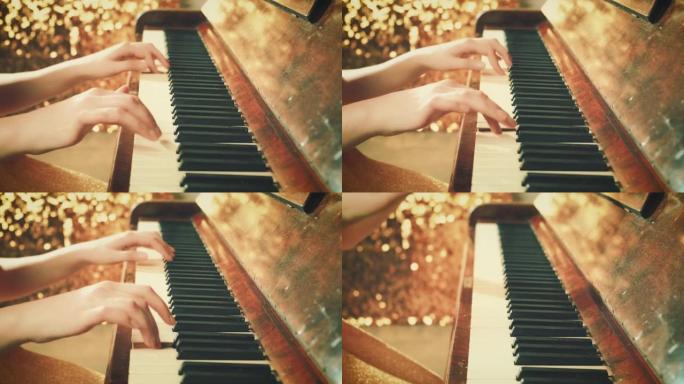 特写美丽的女性双手手指轻轻触摸黑白音乐键。音乐家演奏钢琴背景明亮闪亮的复古金色场景。棕色木制复古古董
