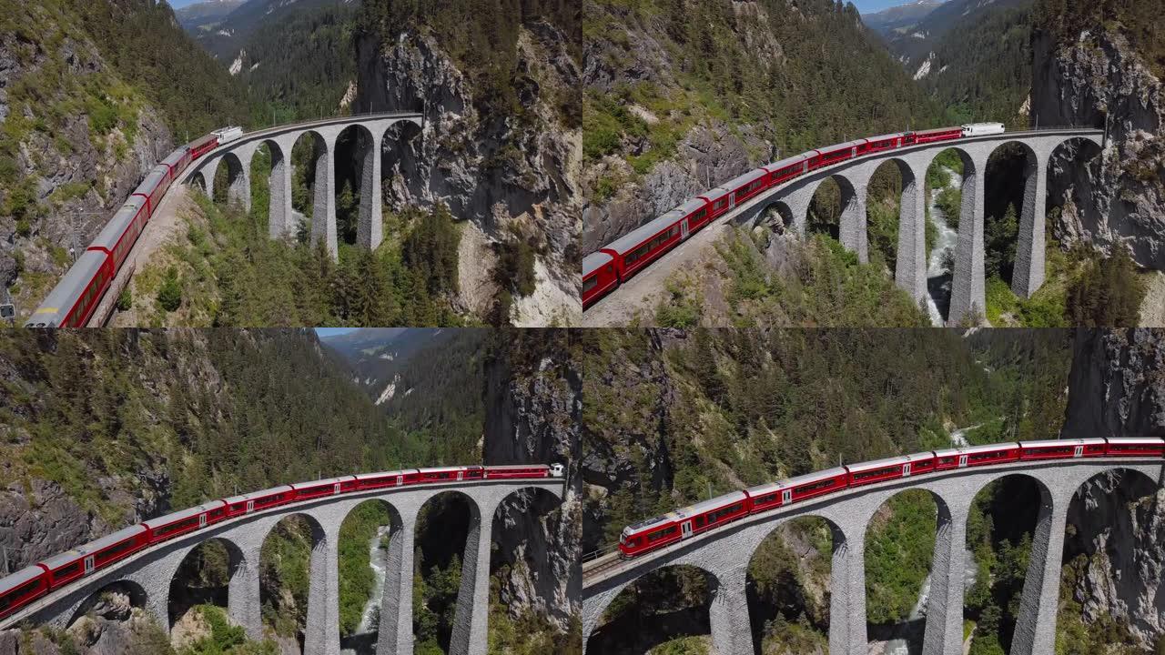 瑞士格劳宾登州著名的兰德瓦瑟高架桥 (Landwasser Viaduct) 上的火车空中全景。