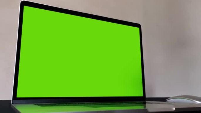 电脑笔记本电脑绿屏，用手指双击按钮