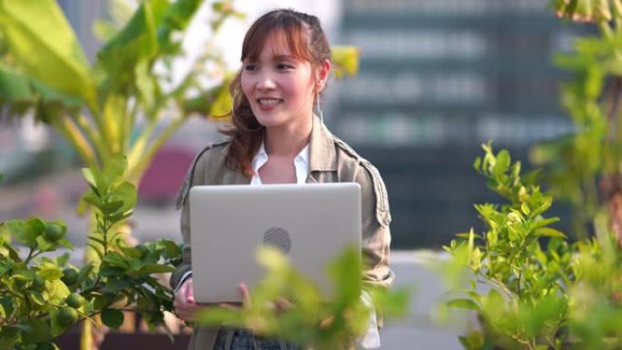 亚洲女企业家在农场中使用人工智能和增强现实技术来帮助种植系统，节约用水，减少资源，减少劳动时间