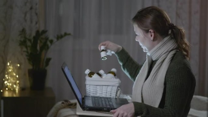 网上订购，健康状况不佳的女孩因流感或流鼻涕病毒接受治疗，使用笔记本电脑和信用卡在家买药