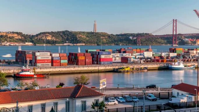 里斯本商业港口天际线延时，4月25日桥，码头上的集装箱，货运起重机
