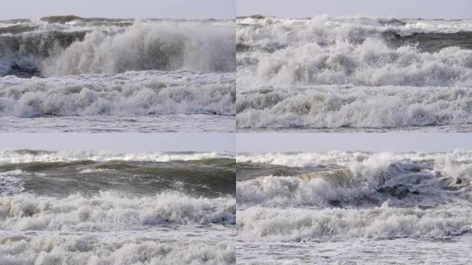 极大的海浪撞击海岸，太平洋美丽的海浪。超级慢动作。风暴期间的海浪。强大的海上热带飓风。全球变暖。恶劣