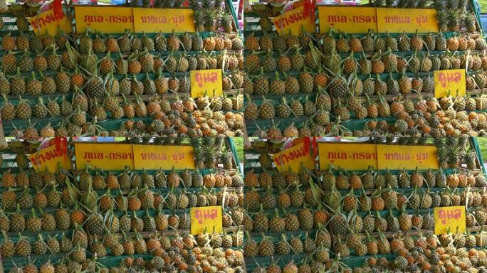 泰国市场上的菠萝国外水果国外集市国外空镜