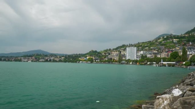 晴天蒙特勒市著名的日内瓦湖湾慢动作全景4k瑞士